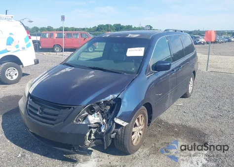2010 Honda Odyssey Ex-L z USA, uszkodzony, nr VIN 5FNRL3H70AB047825